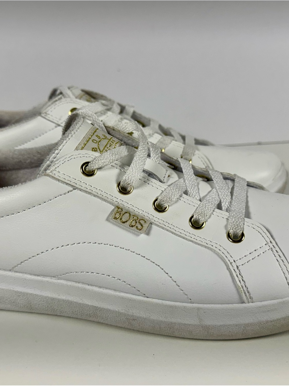 Skechers White Lace-Up Sneaker with Gold Accent